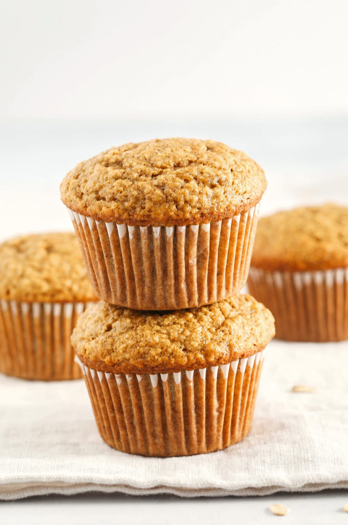 These Healthy Banana Bran Muffins are moist, fluffy, and made healthier with wholesome oat bran cereal, bananas and zero butter or added sugar.  Delicious quick on-the-go morning breakfast!