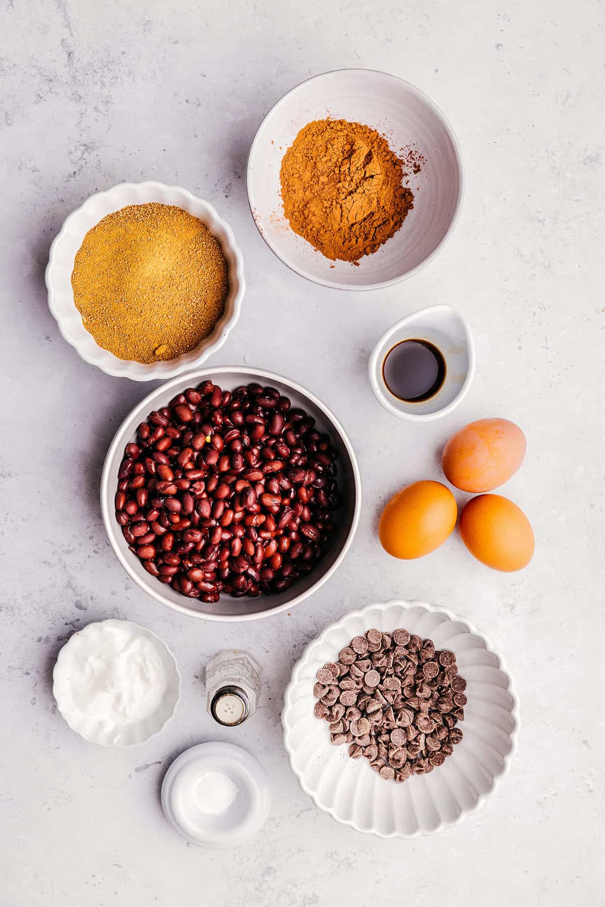 The absolute BEST Flourless Chocolate Chip Brownies that are fudgy, moist and delicious! Made healthier with zero refined sugar, protein-packed black beans, and Greek yogurt!