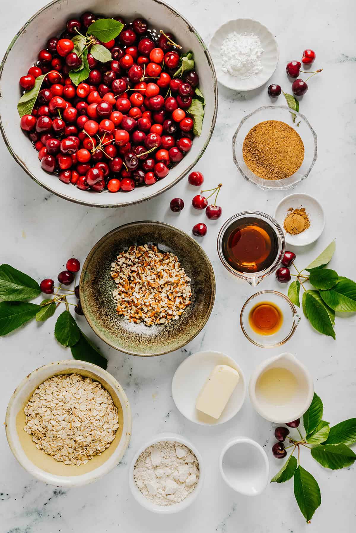 This Healthy Cherry Crisp is the ultimate summer dessert! Bursting with sweet cherries and a wholesome oat topping, this warm cherry crisp easily comes together with just a few simple ingredients!