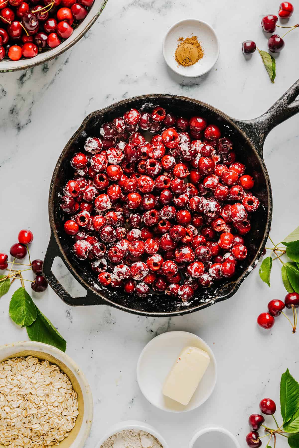 This Healthy Cherry Crisp is the ultimate summer dessert! Bursting with sweet cherries and a wholesome oat topping, this warm cherry crisp easily comes together with just a few simple ingredients!