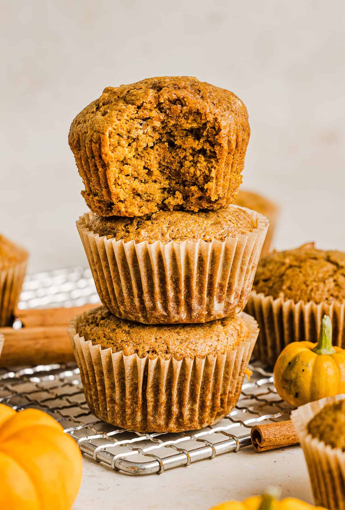 These Whole Wheat Pumpkin Muffins are moist, fluffy, and made healthier with whole wheat flour, applesauce, and zero butter or refined sugar. Loaded with delicious pumpkin flavor and warm spices for the perfect fall muffin!